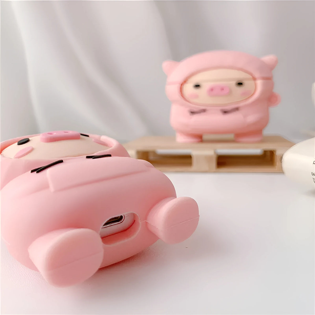 Pink pig cartoon design silicone cover for AirPods 1, 2, and Pro with carrying hook