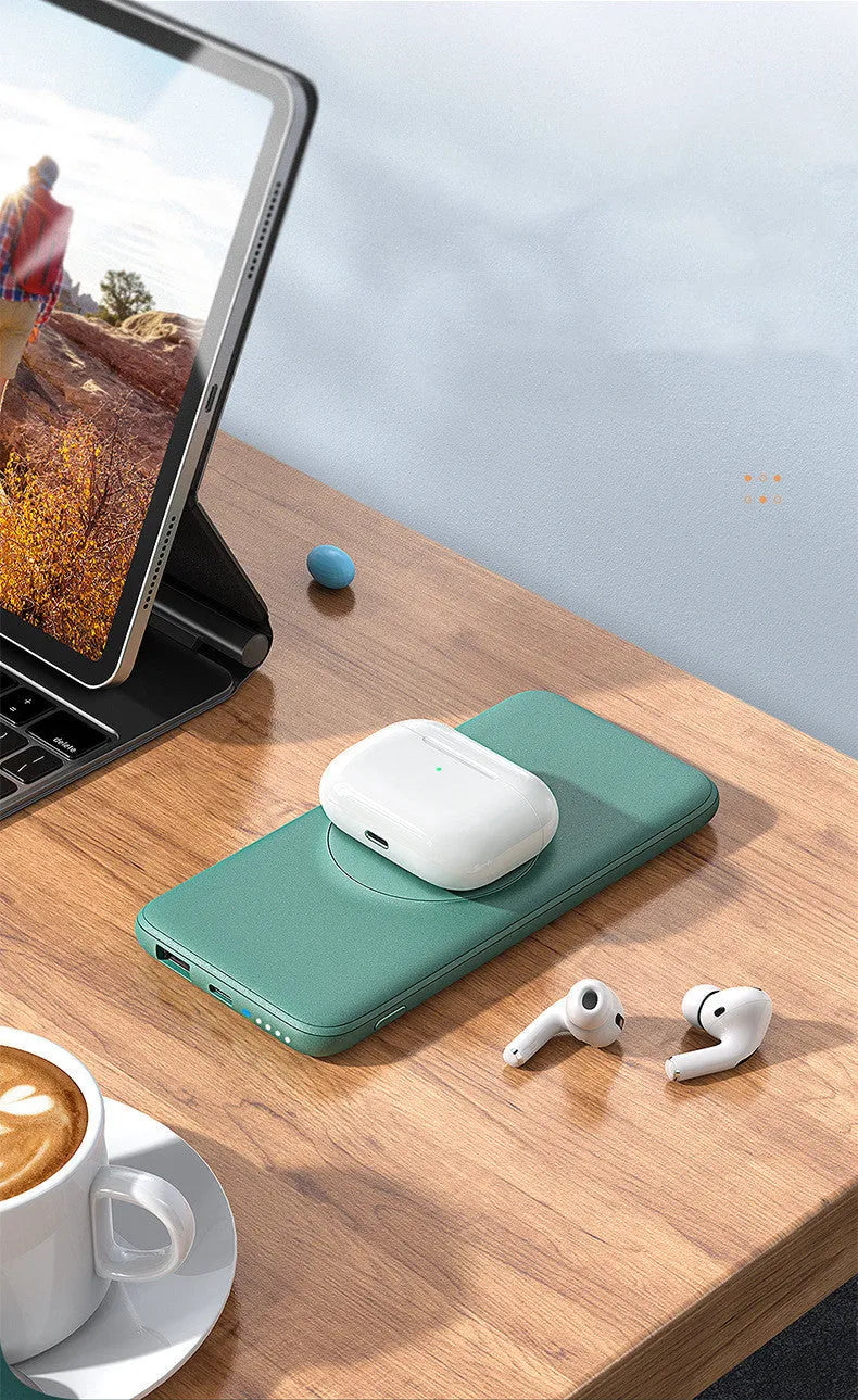 Maiduo Magsafe magnetic wireless power bank in mint green, showing back clip and compact size next to an iPhone.