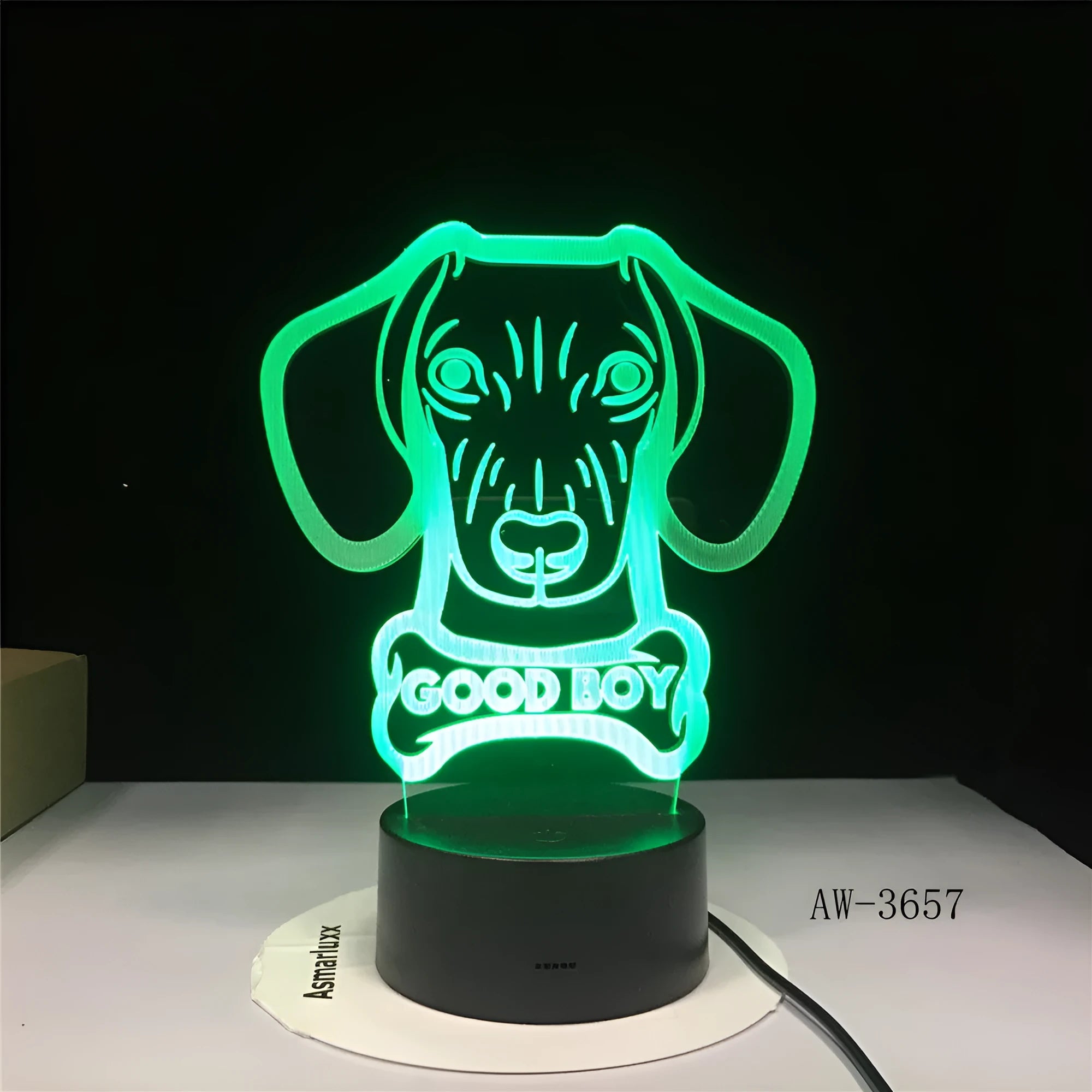 Colour gradient effect LED table lamp with remote control on a wooden surface.