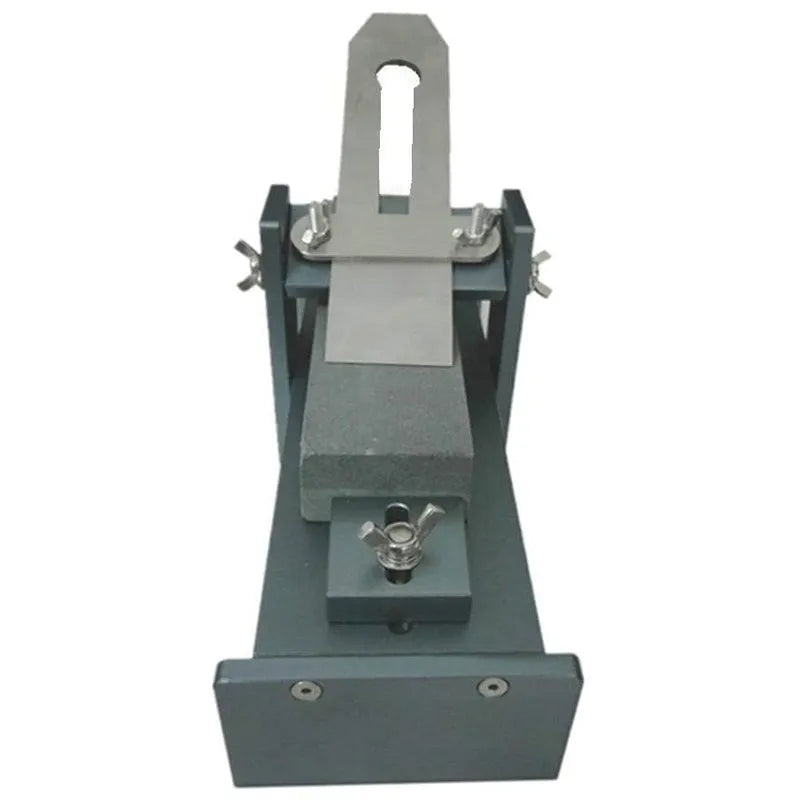 Aluminium alloy fixed angle sharpening tool for woodworking chisels and carving knives on a workbench