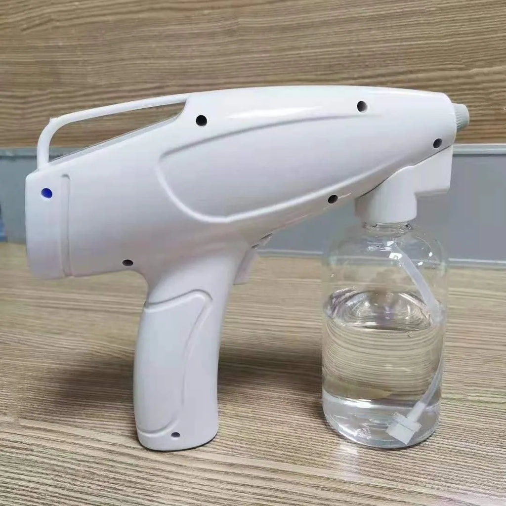 White handheld wireless electric spray gun for disinfection on a plain background.