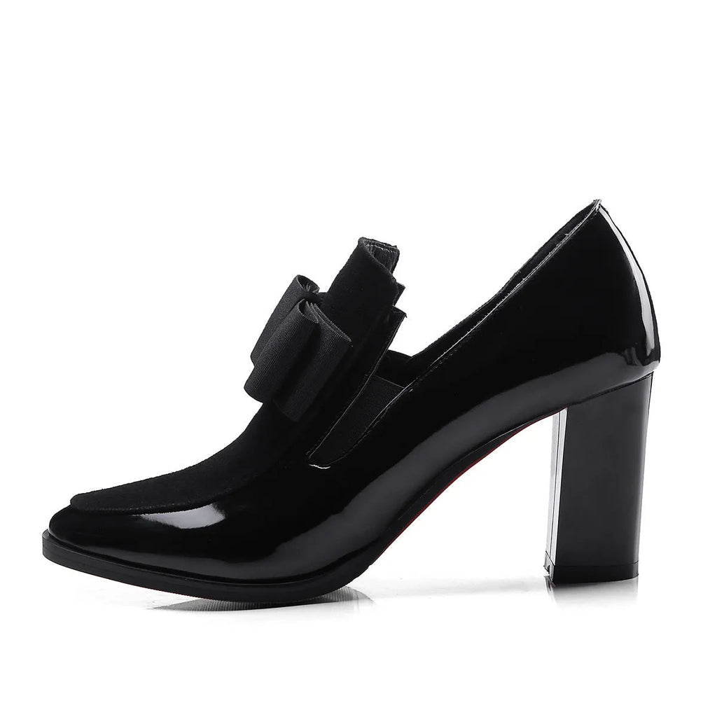 Black patent leather women's high heels with a thick heel and square toe