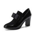 Black patent leather women's high heels with a thick heel and square toe
