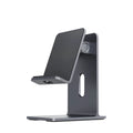 Alloy desktop mobile phone and tablet holder in dark gray or silver colour.