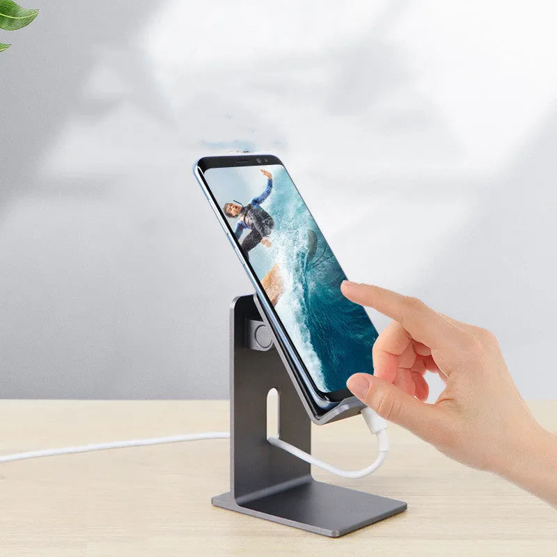 Alloy desktop mobile phone and tablet holder in dark gray or silver colour.