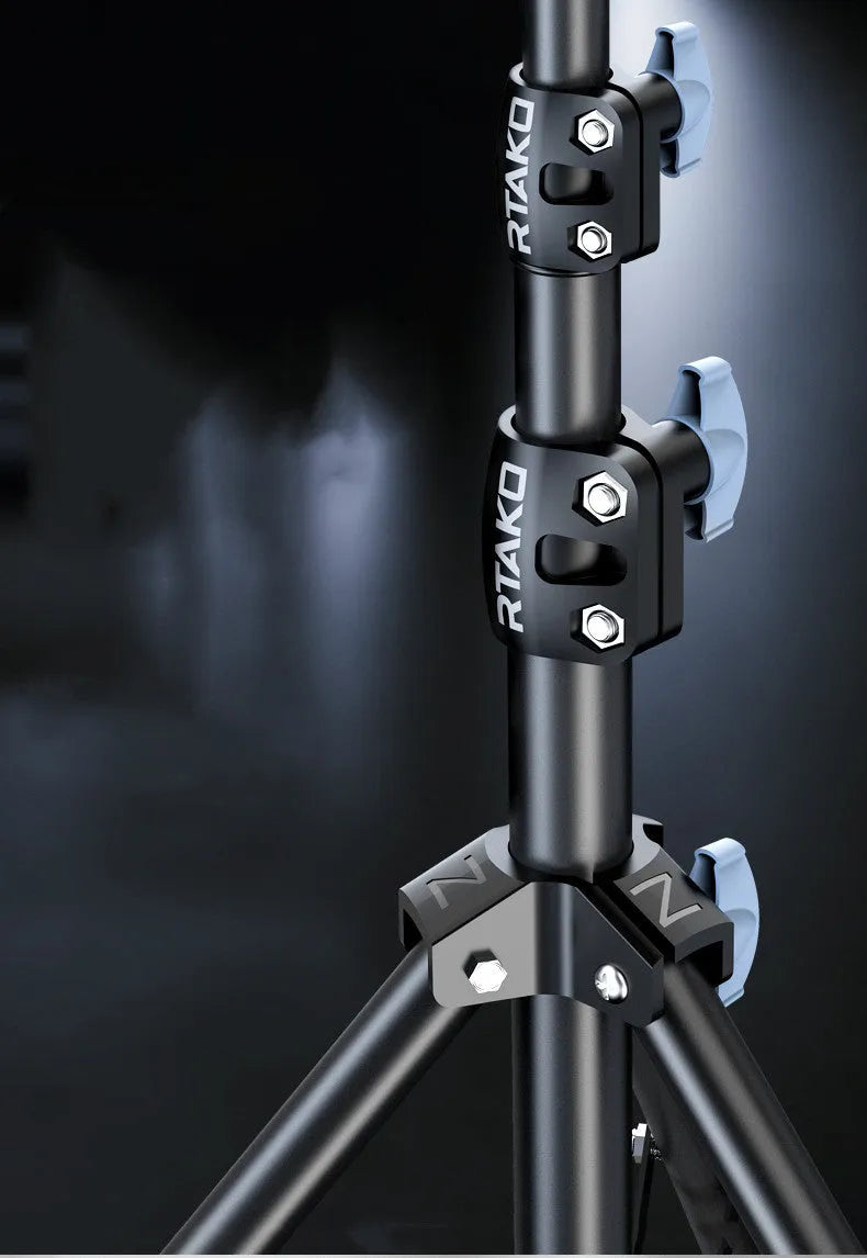 Carbon alloy mobile phone live tripod with mounted ring light and storage bag.