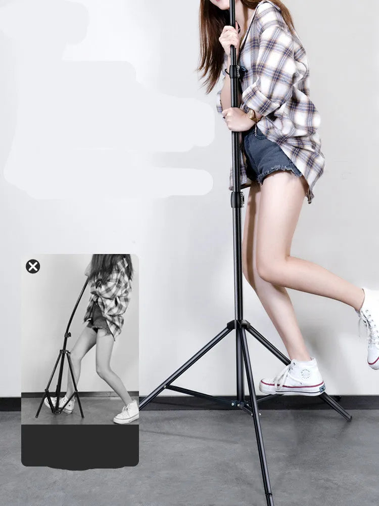 Carbon alloy mobile phone live tripod with mounted ring light and storage bag.