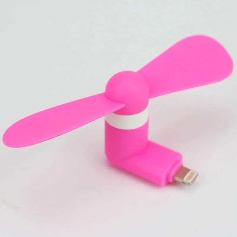 White portable mobile phone mini fan with plastic blades and rotary switch, compatible with Apple and Android smartphones