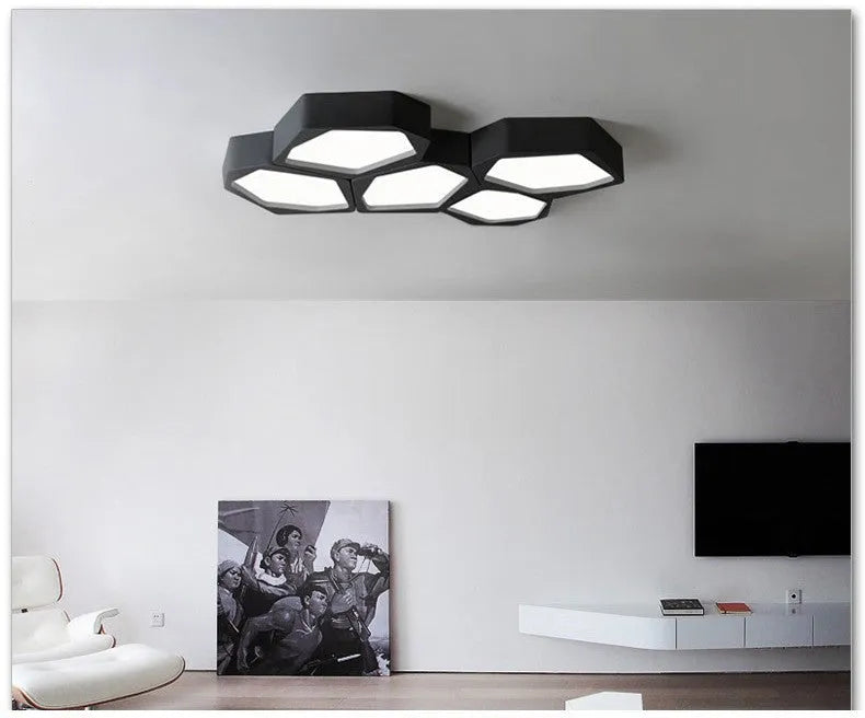 Geometric shaped LED light fixture with iron shade in black or white frame options