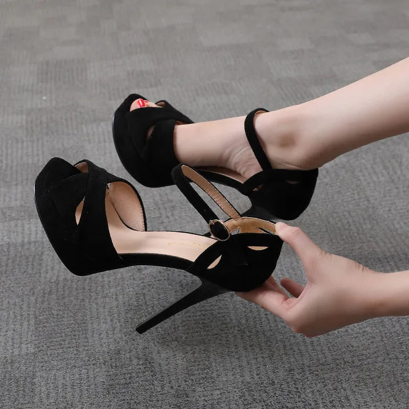 Black suede women's high heel sandals with a fish mouth toe and Roman-style platform design.