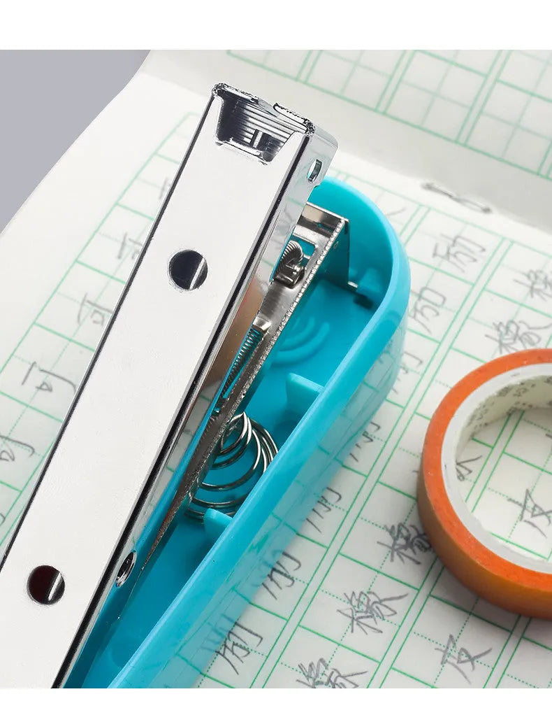 360-degree rotatable desktop stapler shown in dark blue, demonstrating its rotating head and metal nail outlet.