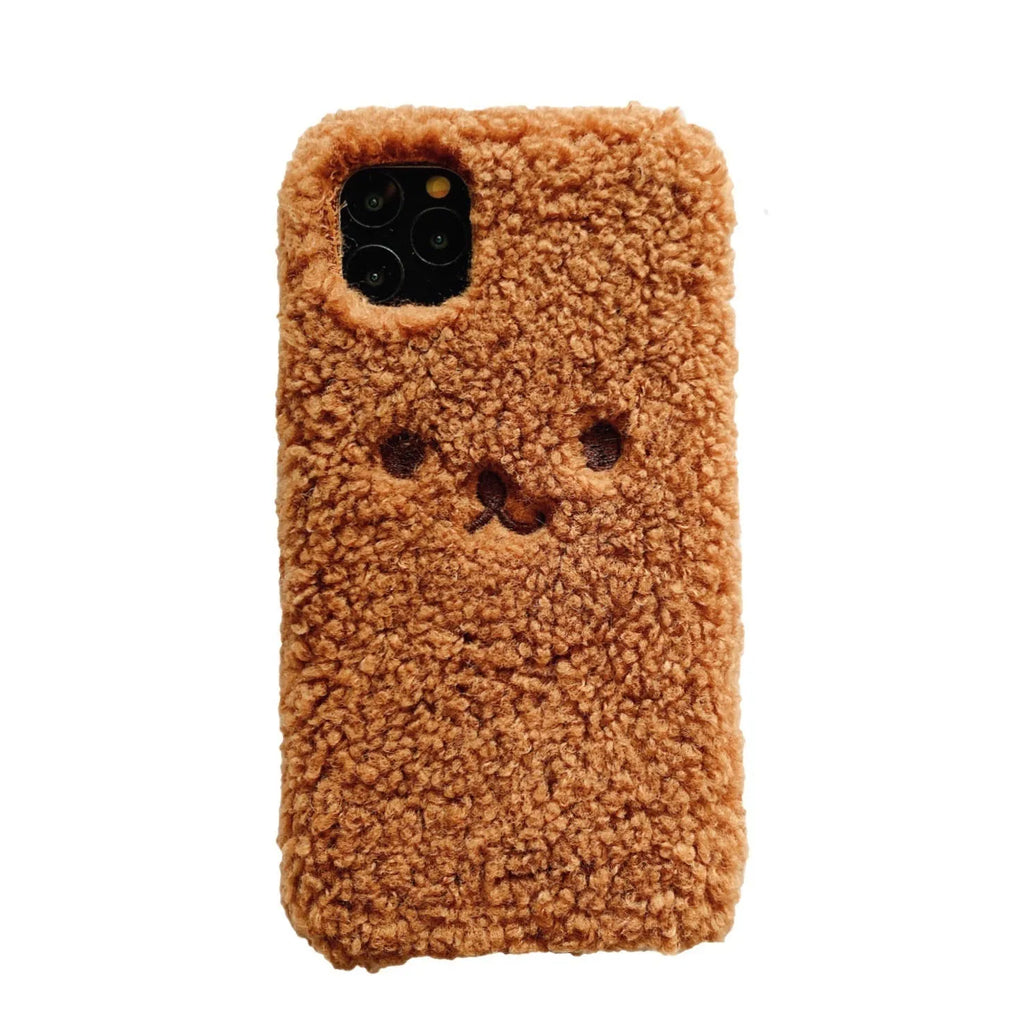Brown embroidery plush cartoon bear face on a soft TPU iPhone case for iPhone 11.