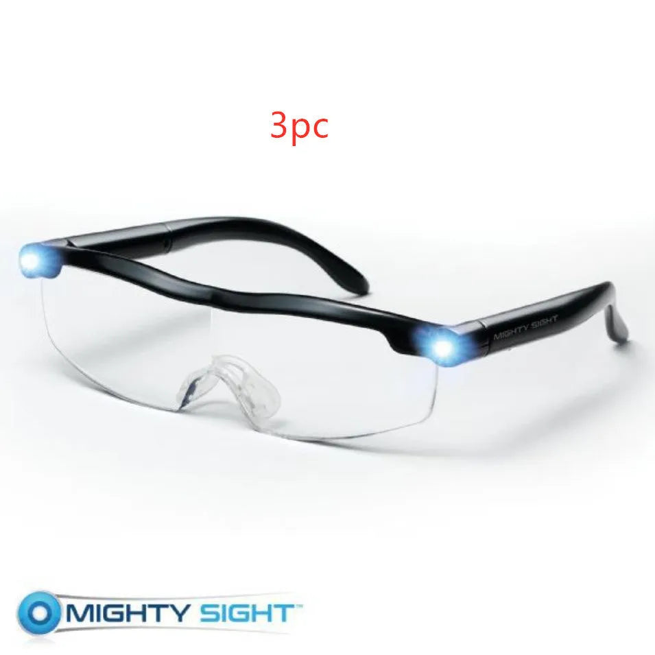 Transparent black USB LED reading glasses with integrated light on the frame.