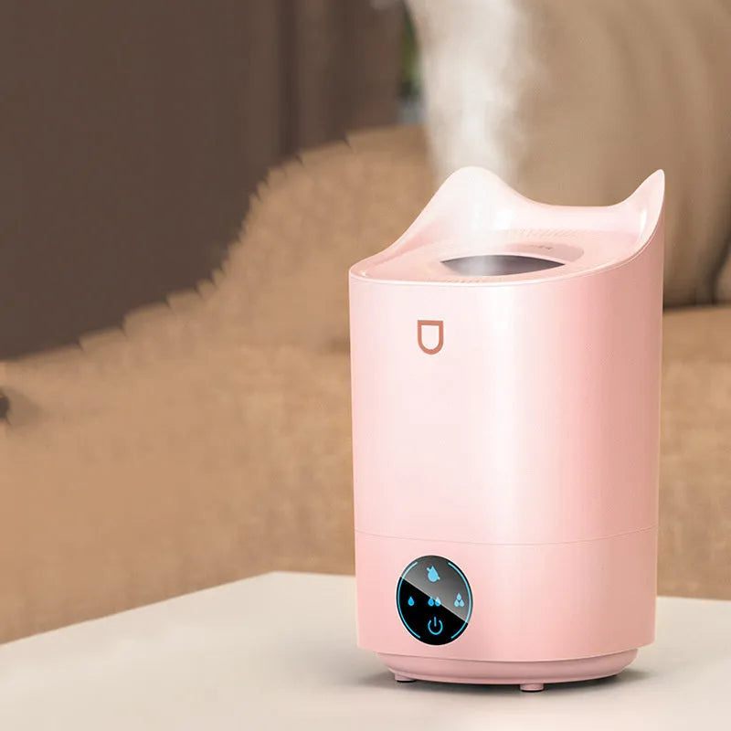 Double spray humidifier with three mist outlets in coral pink or white finish