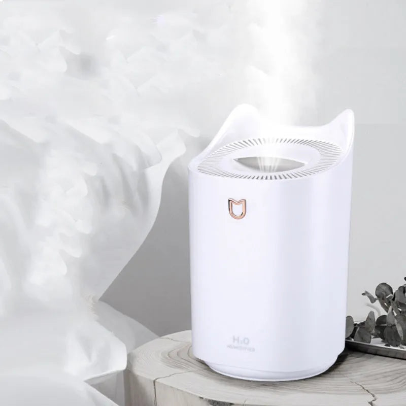 Double spray humidifier with three mist outlets in coral pink or white finish