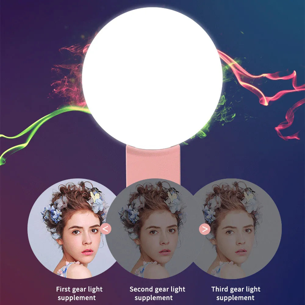 Mini clip-on selfie fill light for mobile phone in white, pink, blue, or black colour options