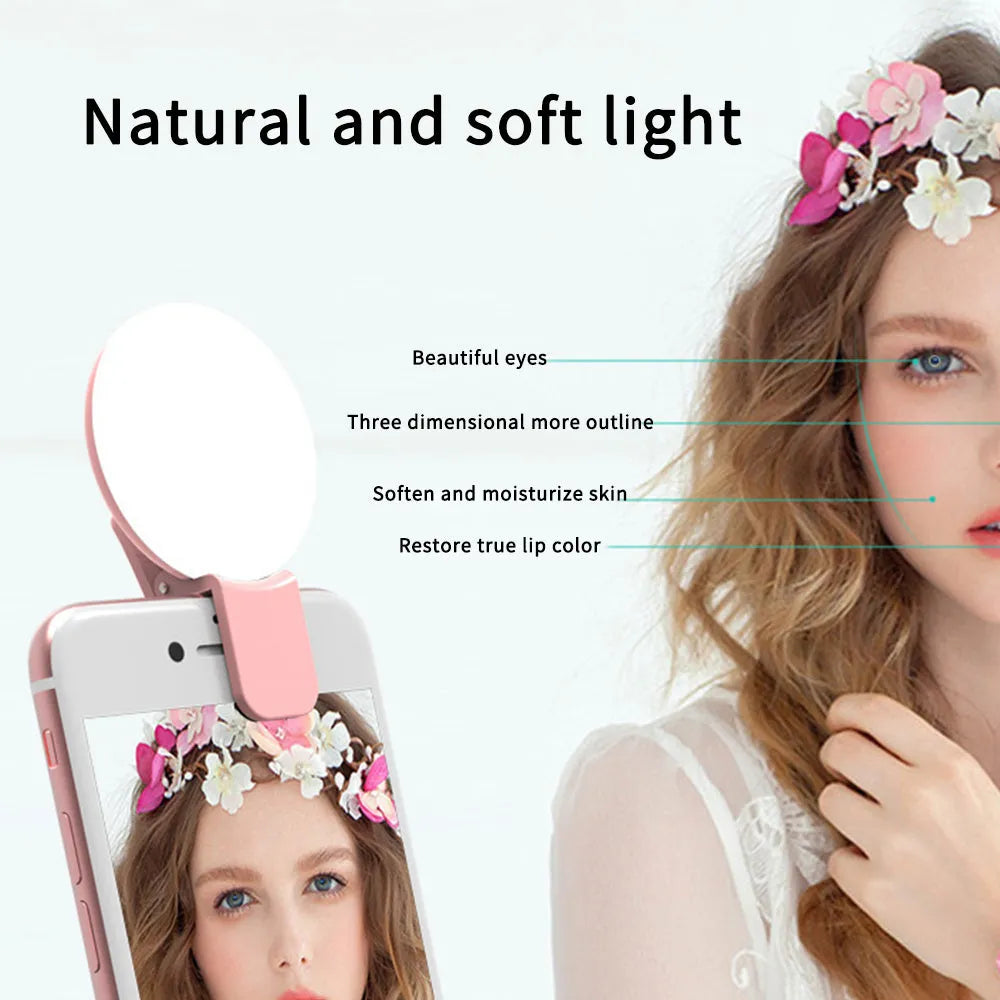 Mini clip-on selfie fill light for mobile phone in white, pink, blue, or black colour options