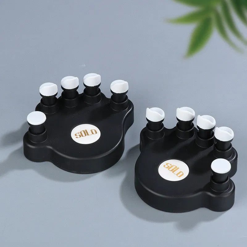 Vertical piano gesture straightener with composite backboard in black, green, or pink for hand position correction.