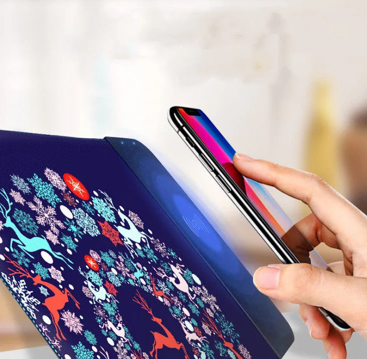Black wireless charging mouse pad with RGB lighting and cartoon design measuring 298x215mm