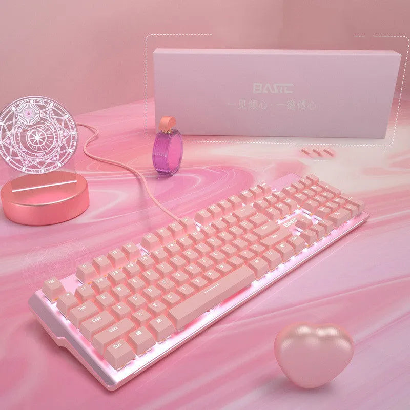 Pink mechanical keyboard and wired mouse gaming set with green switches and USB cables