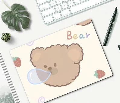 Cartoon girl and character design mouse pad on a desk, size 260mm by 210mm.