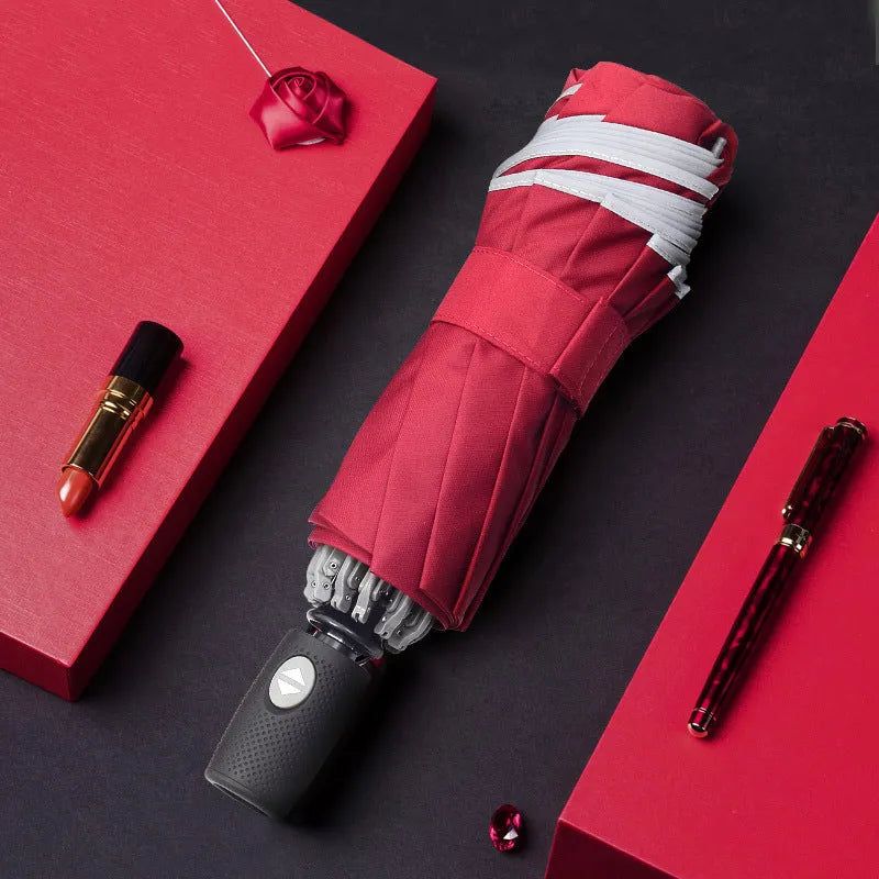 Automatic reverse folding umbrella with 58 cm diameter canopy in black colour showing folded and extended positions