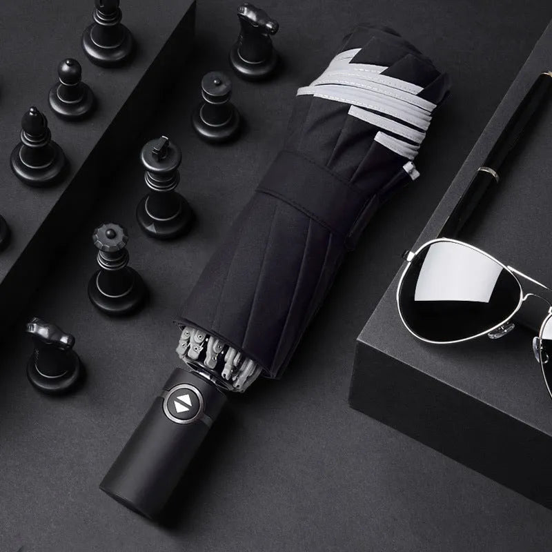 Automatic reverse folding umbrella with 58 cm diameter canopy in black colour showing folded and extended positions