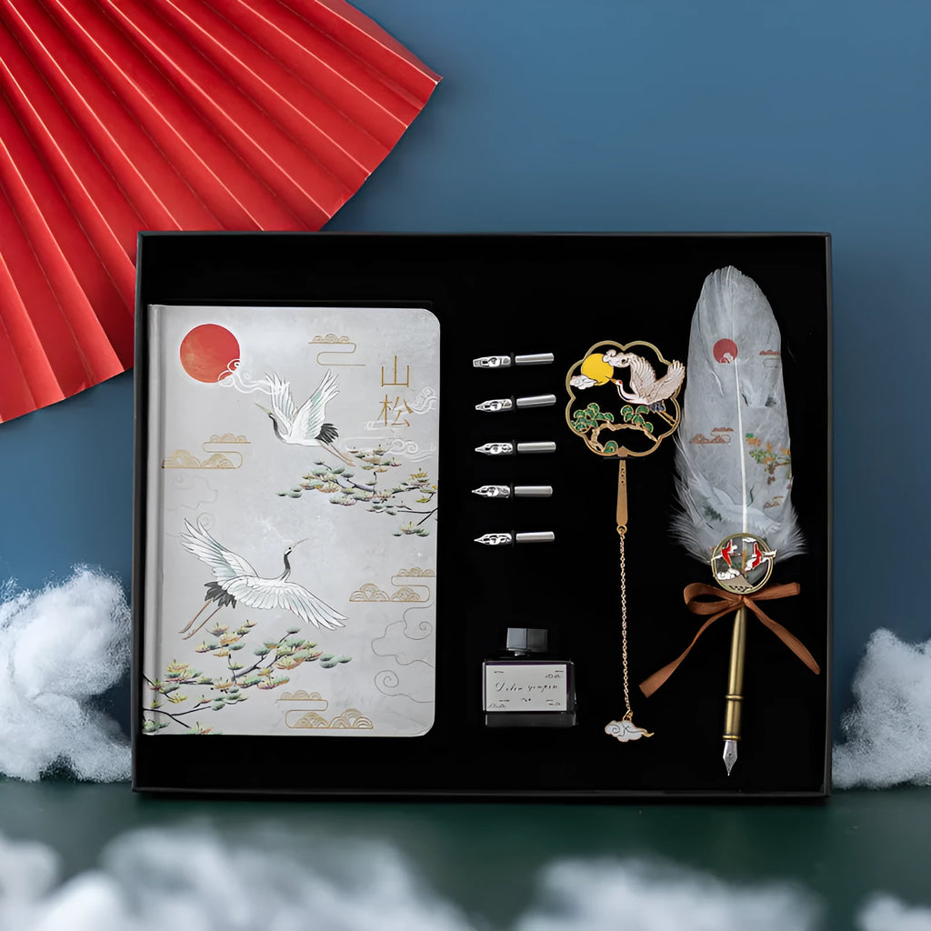 Chinese style feather pen set with metal sheath and notebook showing pens in four different colours
