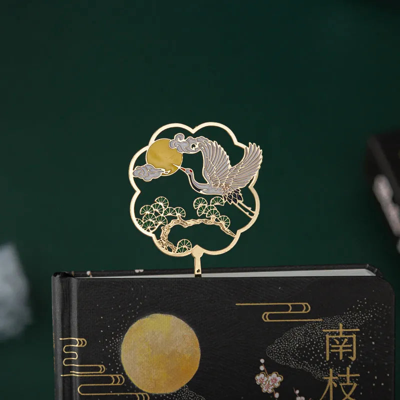 Chinese style feather pen set with metal sheath and notebook showing pens in four different colours