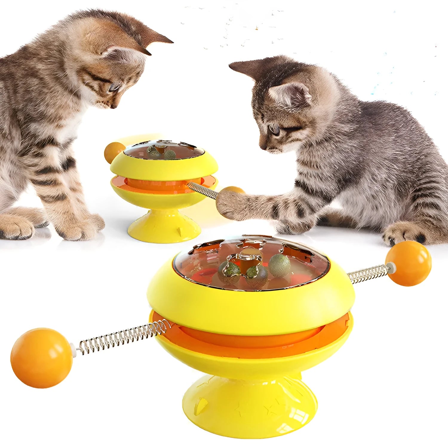 Rotating turntable cat toy with transparent top showing catnip balls, in lake blue colour with a large white suction cup base.