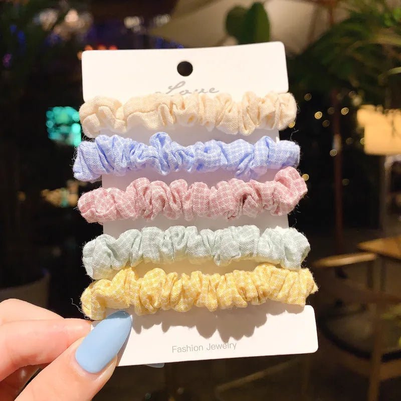 Children's hair accessories set showing small intestine rings and large intestine ropes in autumn colours
