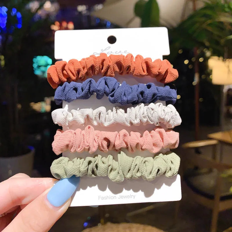 Children's hair accessories set showing small intestine rings and large intestine ropes in autumn colours