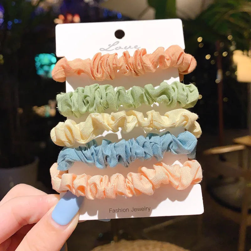 Children's hair accessories set showing small intestine rings and large intestine ropes in autumn colours