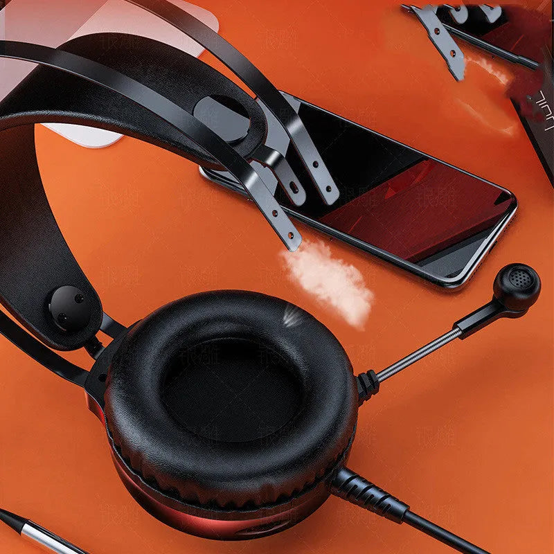 Wired PC gaming headset with microphone, 50mm drivers, and black protein earmuffs