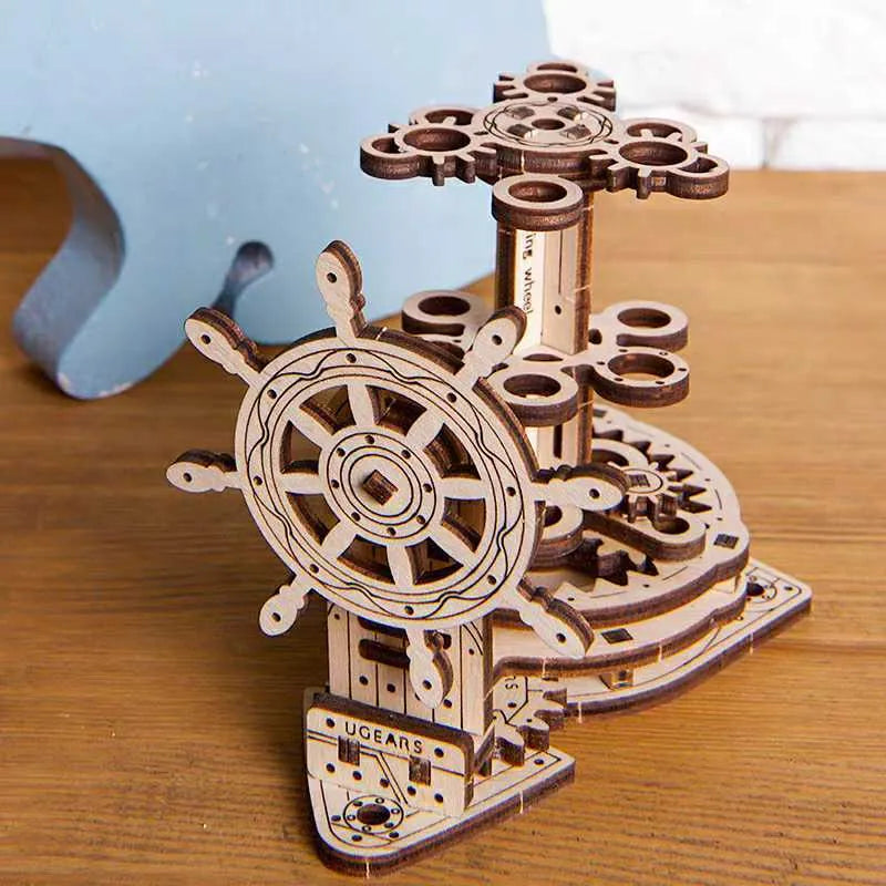 Ukrainian wooden desk pen holder with a steering wheel crank and rotating mechanism.