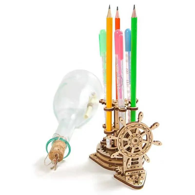 Ukrainian wooden desk pen holder with a steering wheel crank and rotating mechanism.