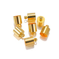 Assortment of electroplated copper weight caps in gold, silver, and bronze finishes for jewellery making.