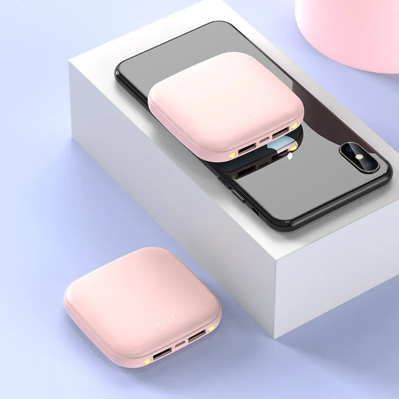 Mini power bank measuring 82x82x27mm with LED flashlight and 20000mAh capacity