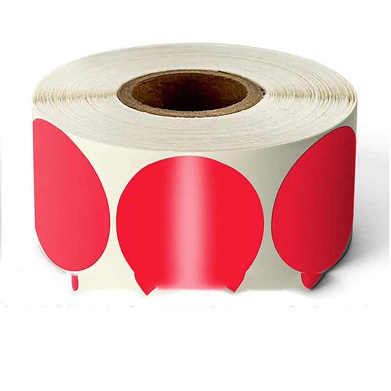 Roll of round colour marker stickers showing multiple colour options including black, blue, red, and kraft paper.