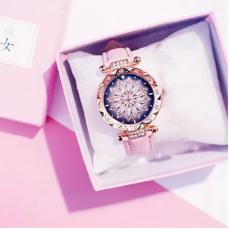 Round 32mm diamond dial ladies watch on wrist, showing pin buckle and available in multiple colours.