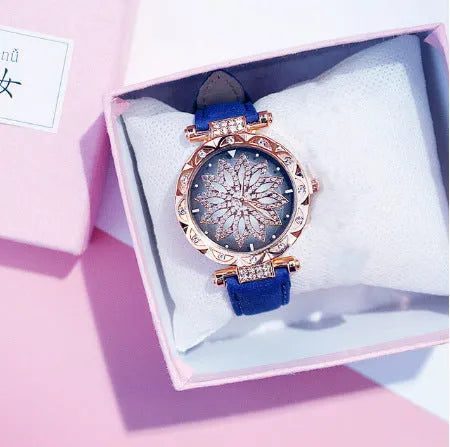 Round 32mm diamond dial ladies watch on wrist, showing pin buckle and available in multiple colours.