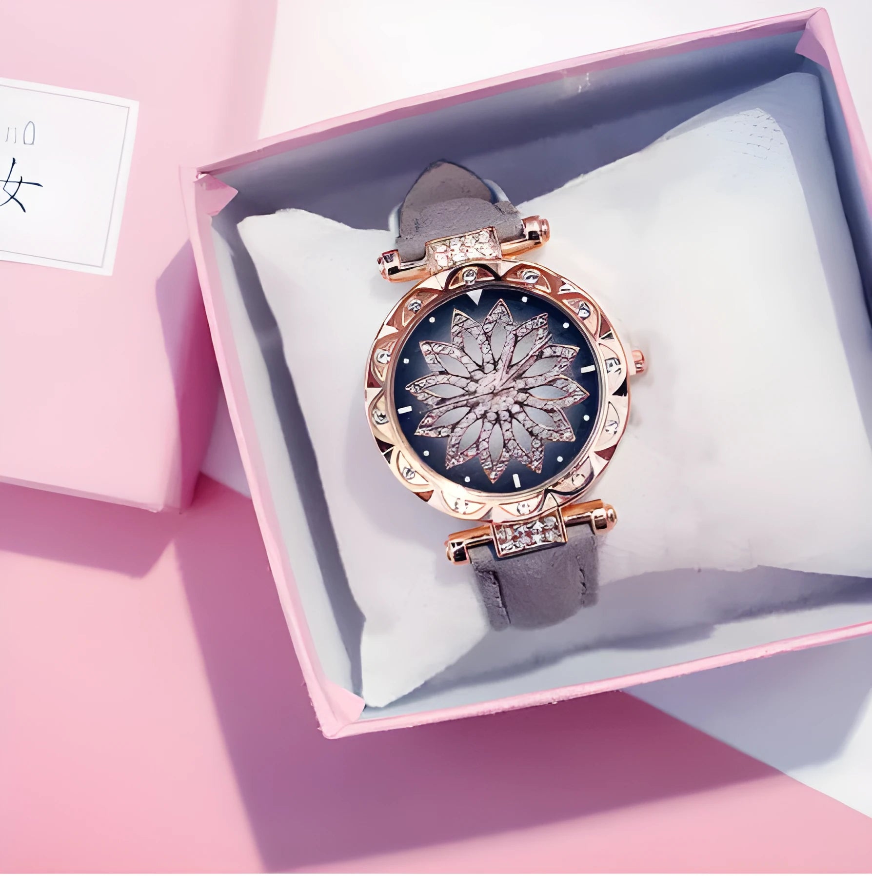 Round 32mm diamond dial ladies watch on wrist, showing pin buckle and available in multiple colours.