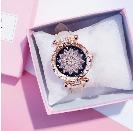 Round 32mm diamond dial ladies watch on wrist, showing pin buckle and available in multiple colours.
