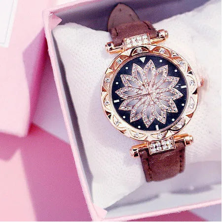 Round 32mm diamond dial ladies watch on wrist, showing pin buckle and available in multiple colours.