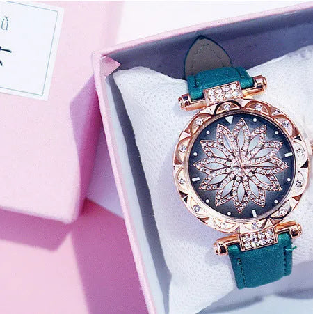 Round 32mm diamond dial ladies watch on wrist, showing pin buckle and available in multiple colours.
