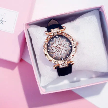 Round 32mm diamond dial ladies watch on wrist, showing pin buckle and available in multiple colours.