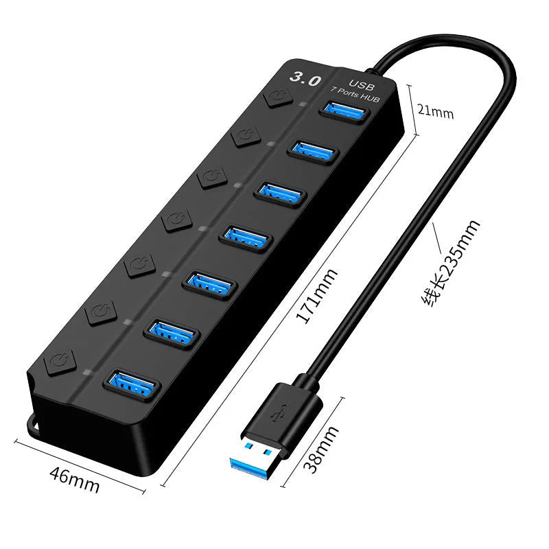 Black 7-port USB 3.0 hub with external power adapter on a desk