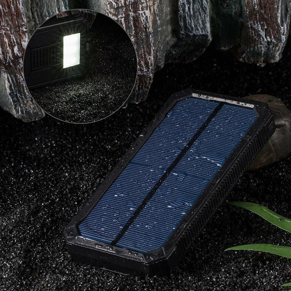Solar power bank in orange colour showing solar panel and multiple USB ports