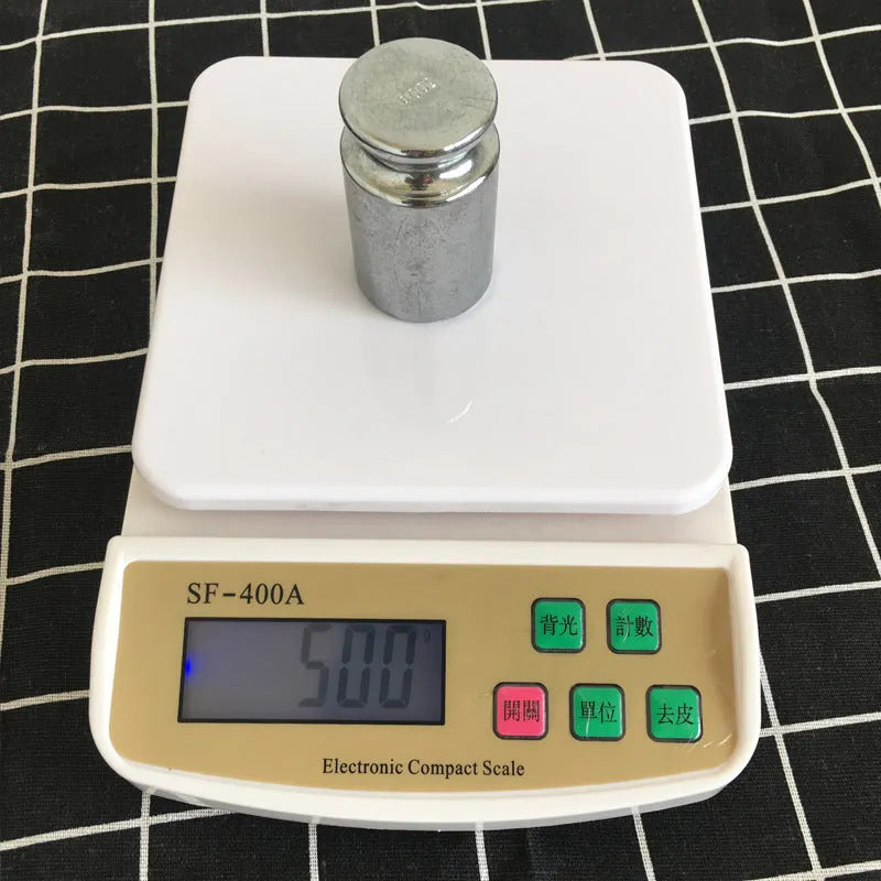 SF-400A electronic kitchen food scale with digital display showing weight measurement