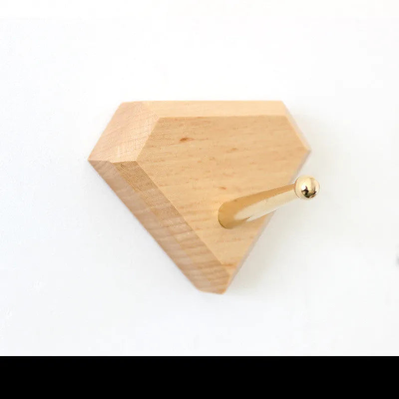 Natural beech wood adhesive wall hook with brass fitting in five minimalist shapes